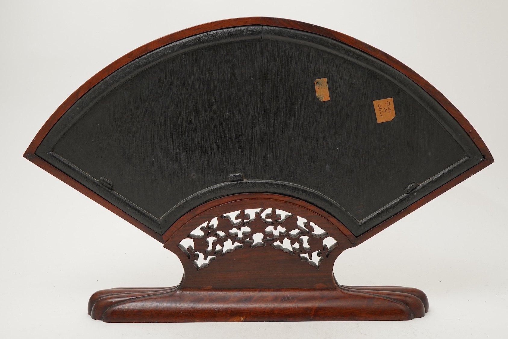 A Chinese painted paper fan leaf, 19th century, with hongmu frame and stand, early 20th century